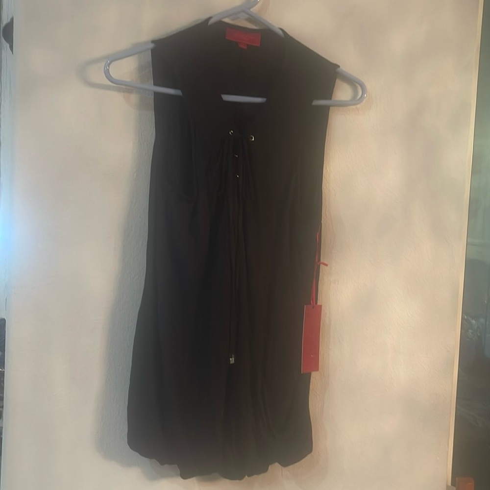 J Lo long black loose tank.  Ties up front partially.  NWT size L